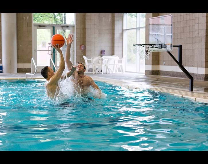 Thumbnail for RockSolid Pool Basketball Hoop Extended Reach in Action
