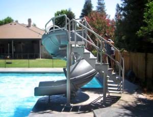 Thumbnail for S.R. Smith Vortex pool slide shown in typical pool application