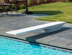 Thumbnail for A white Flyte-Deck II diving board on a swimming pool