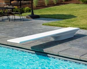 Image for A white Flyte-Deck II diving board on a swimming pool